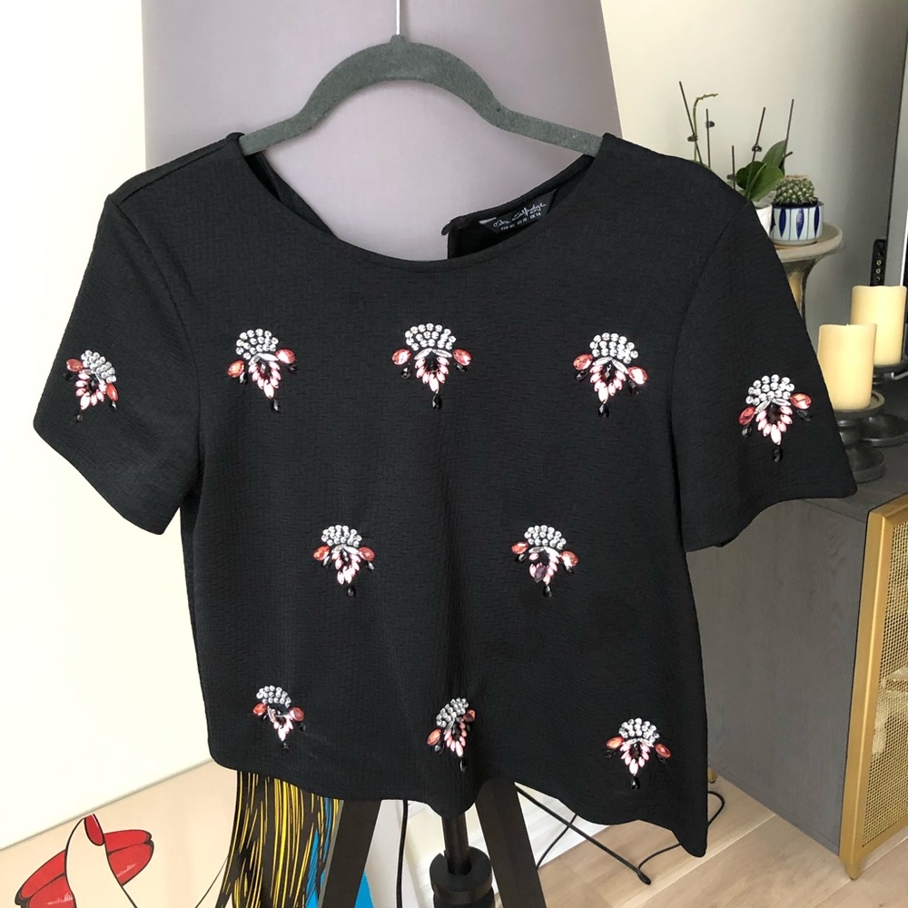 Black top with pink beaded embellishments